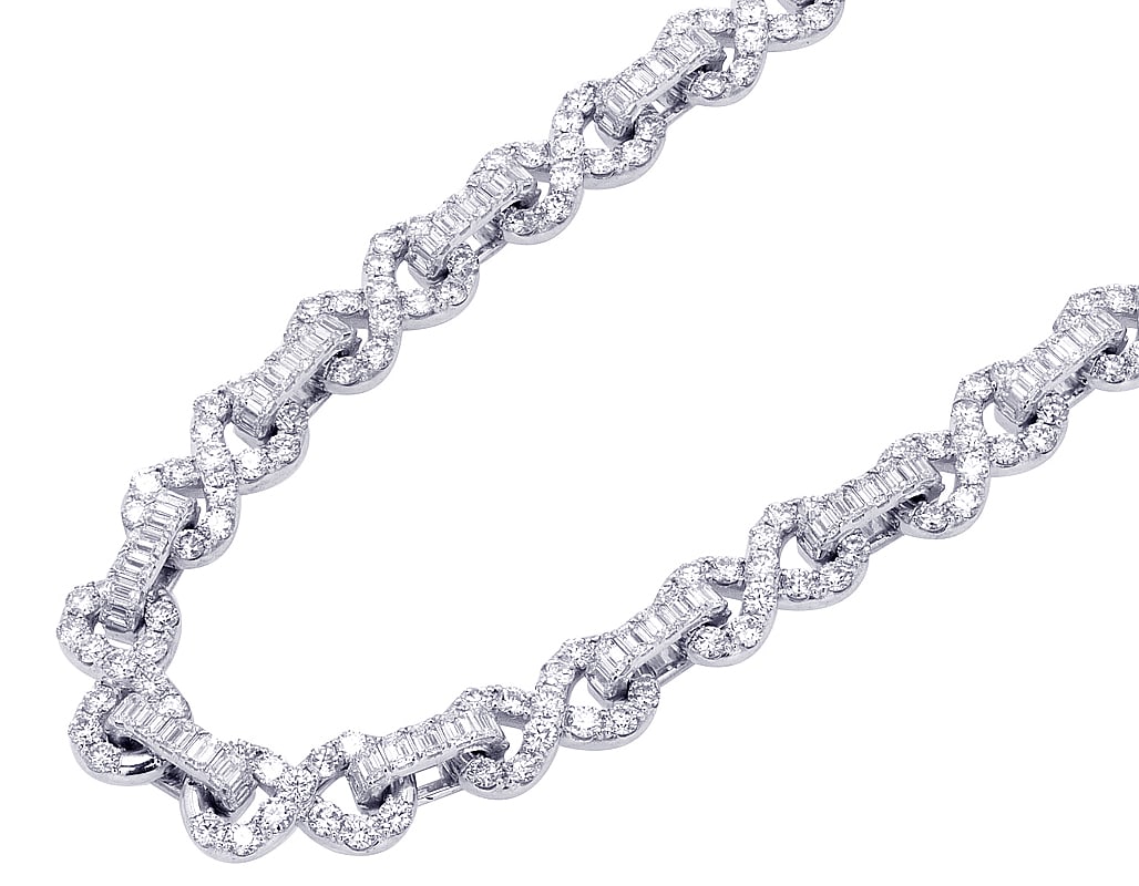 10K GOLD INFINITY LINK BAGUETTE & ROUND DIAMOND CUBAN CHAIN NECKLACE: 10K Gold Infinity Link Baguette & Round Diamond Cuban Chain Necklace Brand: None Type: Necklace Material: Metal White Gold Main Stone Natural Color: White Gold Size: Width 10MMmm Length22" in Acc