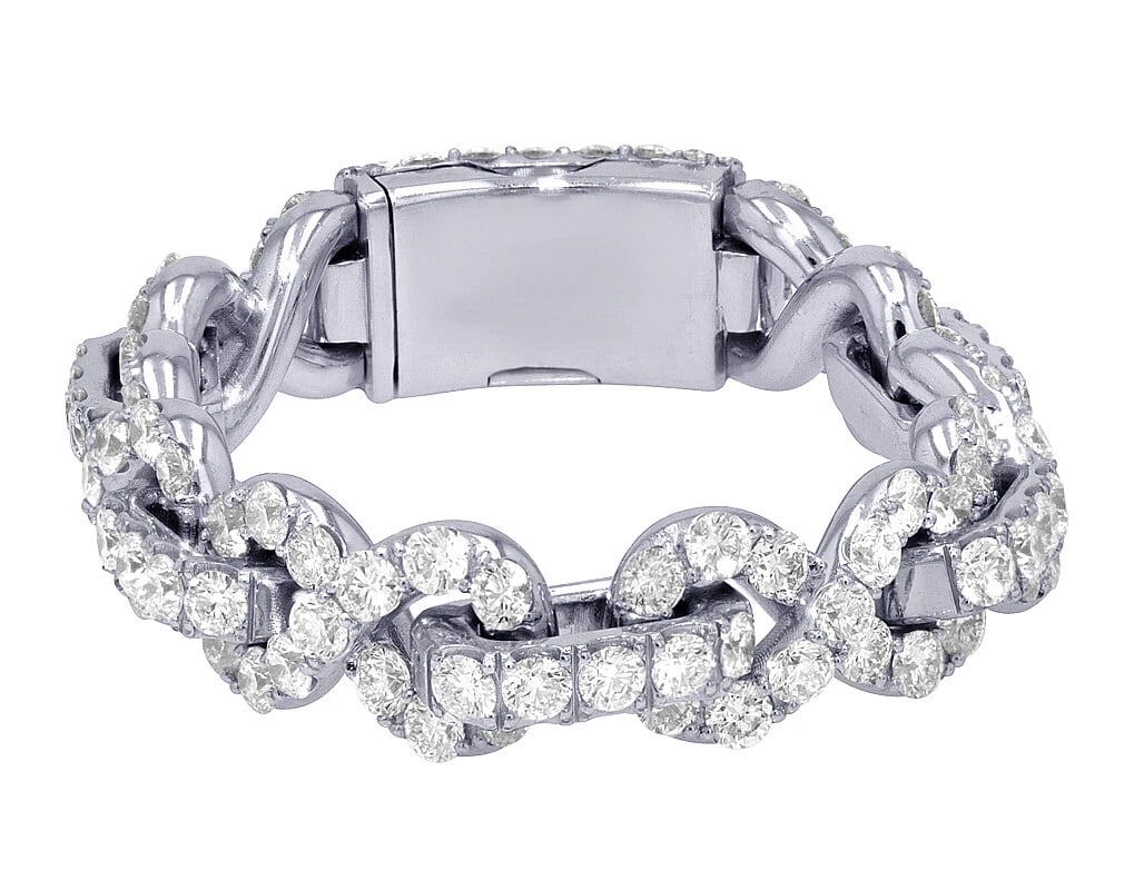 INFINITY LINEAR LINKS 25 POINTER REAL DIAMOND BRACELET: Infinity Linear Links 25 Pointer Real Diamond Bracelet Brand: None Type: Bracelet Material: Metal White Gold Main Stone Natural Color: None Size: Dimension L 7.5" x W 14mm Width 14.0mm Length 7.5