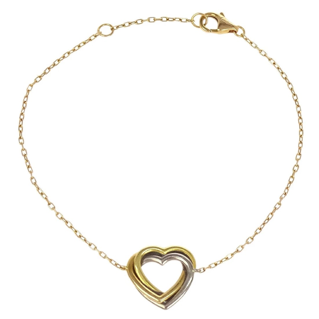 CARTIER TRINITY HEART BRACELET AU750: Cartier Trinity Heart Bracelet Au750 Brand: Cartier Type: Bracelet Material: Au750 Color: Gold Size: Inner circumference : 16.0 cm Charm: W 1.4 x H 1.4 cm Accessories: None Accessories