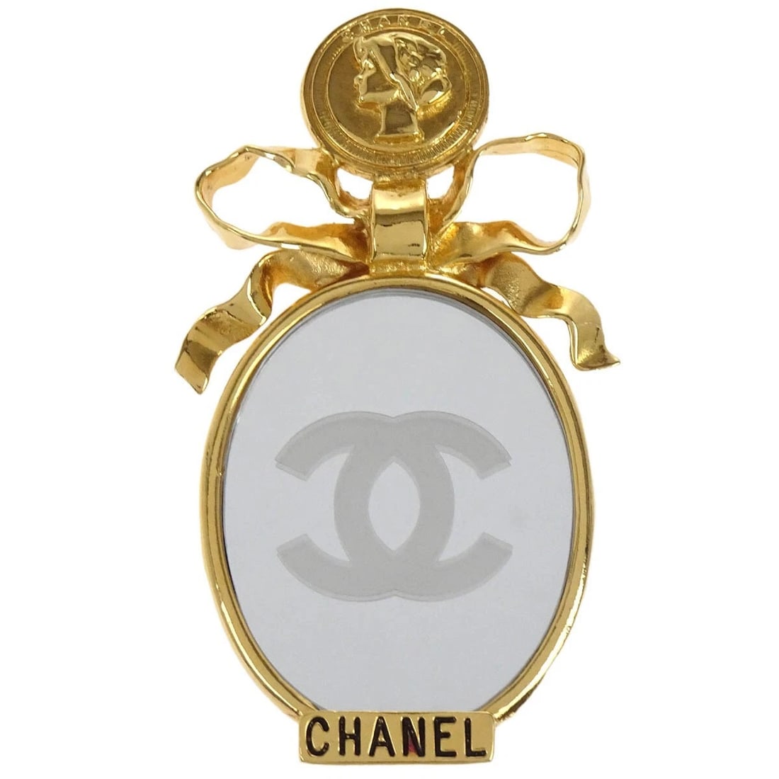 CHANEL BOW MIRROR BROOCH PIN GOLD: Chanel Bow Mirror Brooch Pin Gold Brand: CHANEL Type: Brooch Material: Gold Plated Color: Gold Size: W 5.0 x H 9.0 cm Accessories: None Accessories Notice: When purchasing pre-owned goods,
