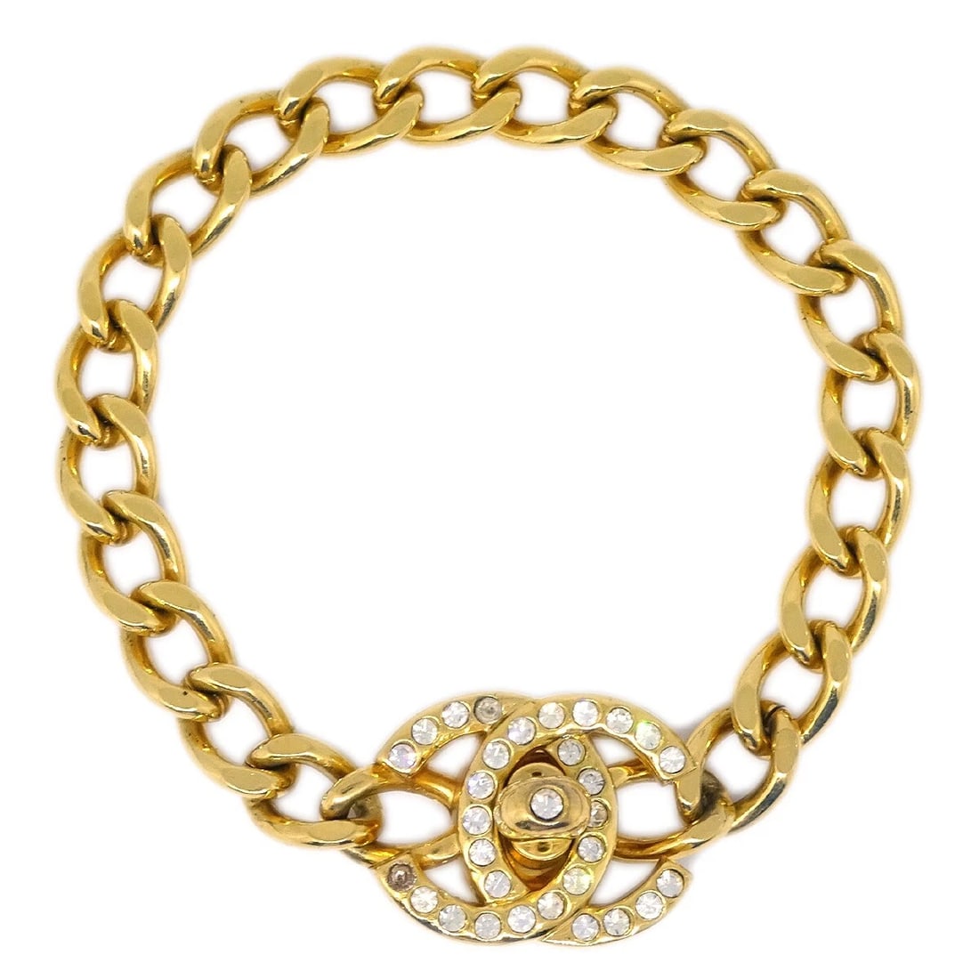 CHANEL TURNLOCK RHINESTONE GOLD CHAIN BRACELET: Chanel Turnlock Rhinestone Gold Chain Bracelet Brand: CHANEL Type: Bracelet Material: Gold-plated Rhinestone Main Stone/Creation Rhinestone Color: Gold Size: Inner circumference : 16.5 cm