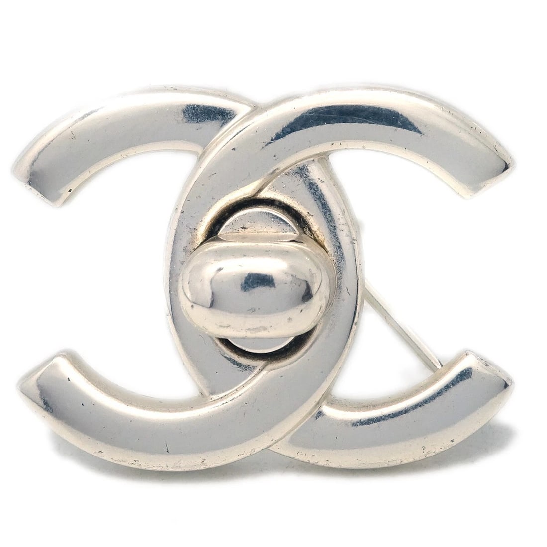 CHANEL TURNLOCK BROOCH PIN SILVER: Chanel Turnlock Brooch Pin Silver Brand: CHANEL Type: Brooch Material: Silver Plated Color: Silver Size: W 3.2 x H 2.5 cm Accessories: None Accessories Notice: When purchasing pre-owned