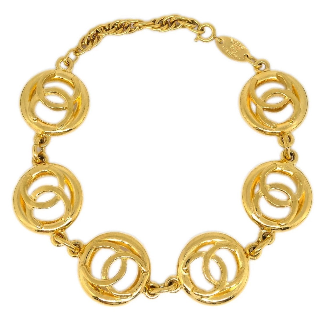 CHANEL CC BRACELET GOLD: Chanel CC Bracelet Gold Brand: Chanel Type: Bracelet Material: Gold Plated Color: Gold Size: Inner circumference : 24.0 cm Medallion : Diameter 2.0 cm Accessories: None Accessories Notice: