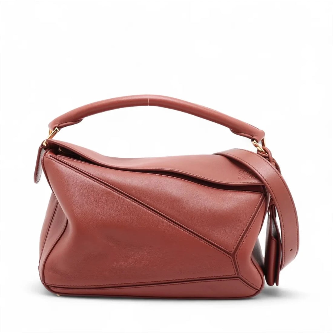 LOEWE PUZZLE BAG SMALL LEATHER 2 WAY HANDBAG: Loewe Puzzle Bag Small Leather 2 Way Handbag Brand: Loewe Type: Hand bag Material: Leather Color: Brown Size: Height:5.9inch Length:9.3inch Depth:3.9inch Handle height:3.0inch Shoulder height:22.0