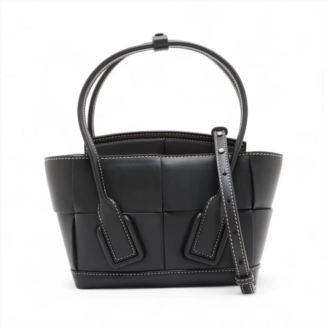 BOTTEGA VENETA MAXI INTRECCIATO MINI ARCO LEATHER 2 WAY HANDBAG: Bottega Veneta Maxi Intrecciato Mini Arco Leather 2 Way Handbag Brand: Bottega Veneta Type: Hand bag Material: Leather Color: Black Size: Height:6.7inch Length:7.1inch Depth:3.3inch Handle height: