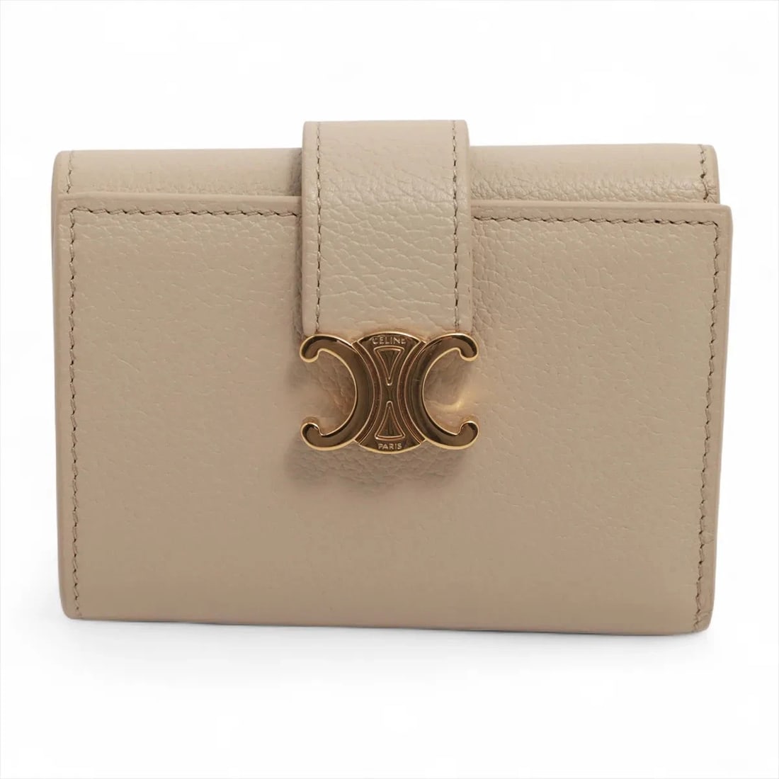 CELINE TRIOMPHE FINE STRAP WALLET LEATHER COMPACT WALLET: Celine Triomphe Fine strap wallet Leather Compact Wallet Brand: Celine Type: Compact Wallet Material: Leather Color: Beige Size: Height:3.1inchLength:4.1inchDepth:0.8inch Accessories: None