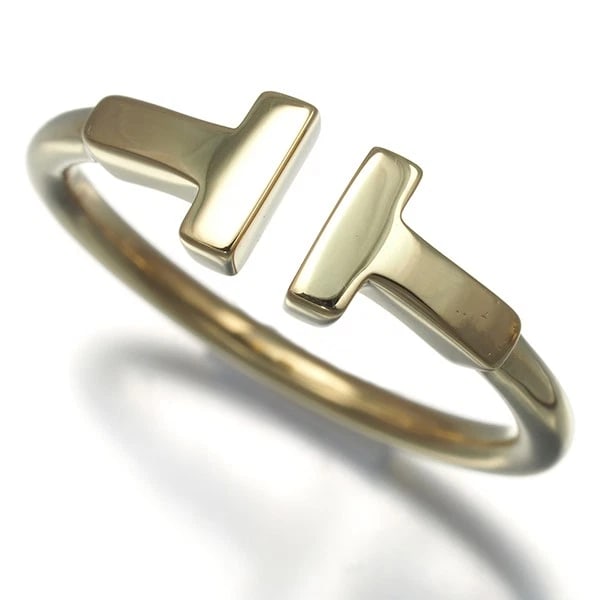 TIFFANY&CO. RING TIFFANY T WIRE 18K 750 YELLOW GOLD: Tiffany&Co. Ring Tiffany T Wire 18K 750 Yellow Gold Brand: Tiffany & Co. Type: Ring Material: 18K / 750 / Yellow Gold Color: None Size: US 6-6.25 Accessories: None Accessories Notice: When