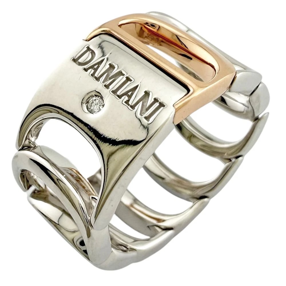 DAMIANI RING K18 WHITE GOLD K18 PINK GOLD DIAMOND: Damiani Ring K18 white gold K18 Pink Gold diamond Brand: Damiani Type: Ring Material: K18 white gold Main Stone/Creation Natural Color: Pink gold Size: US 6 1/8 Accessories: None Accessori