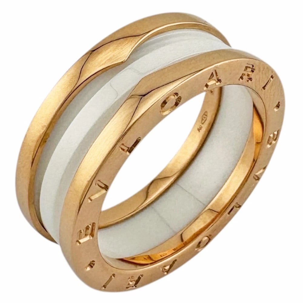 BVLGARI RING K18 PINK CERAMIC B-ZERO.1 B-ZERO: BVLGARI Ring K18 Pink ceramic B-zero.1 B-Zero Brand: BVLGARI Type: Ring Material: K18 Pink Gold Color: white Size: US 8 1/2 Accessories: None Accessories Notice: When purchasing pre-owned