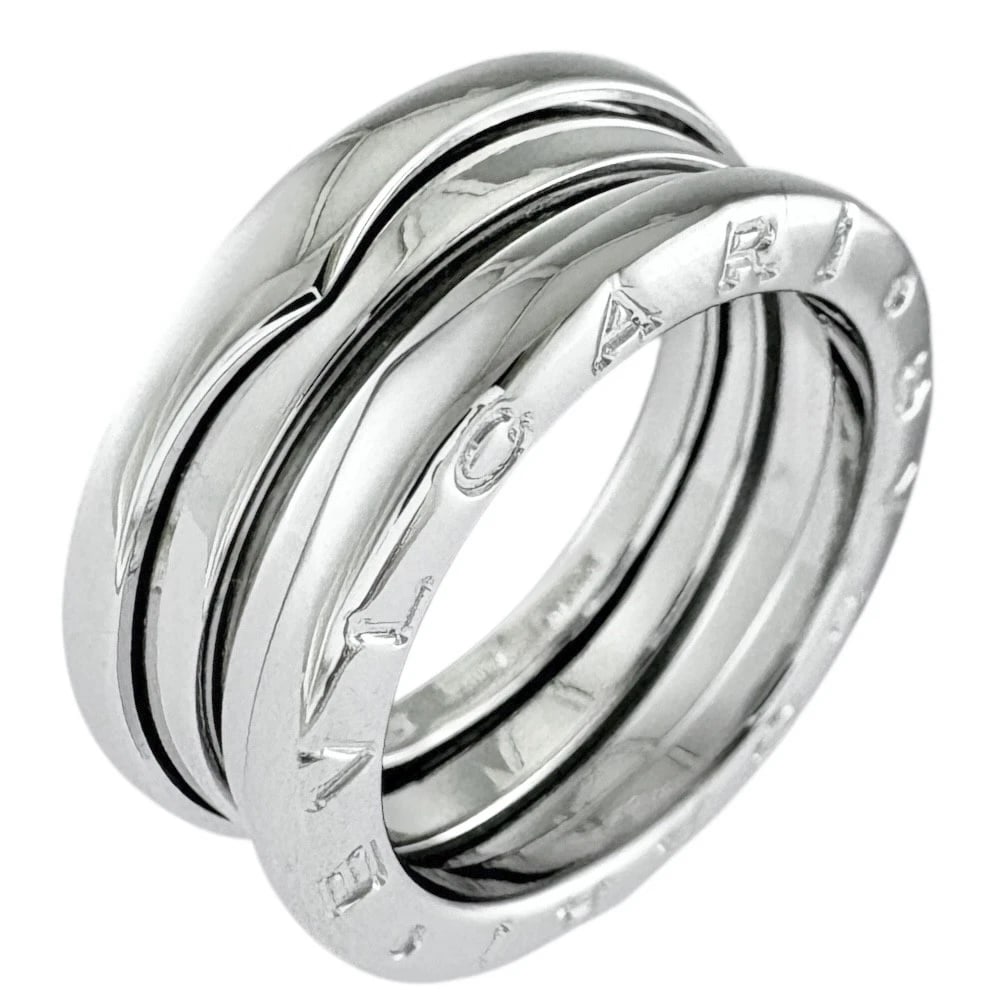 BVLGARI RING K18 WHITE GOLD B-ZERO.1 3 BANDS: BVLGARI Ring K18 white gold B-zero.1 3 bands Brand: BVLGARI Type: Ring Material: K18 white gold Color: Silver Size: US 5 1/8 Accessories: None Accessories Notice: When purchasing pre-owned