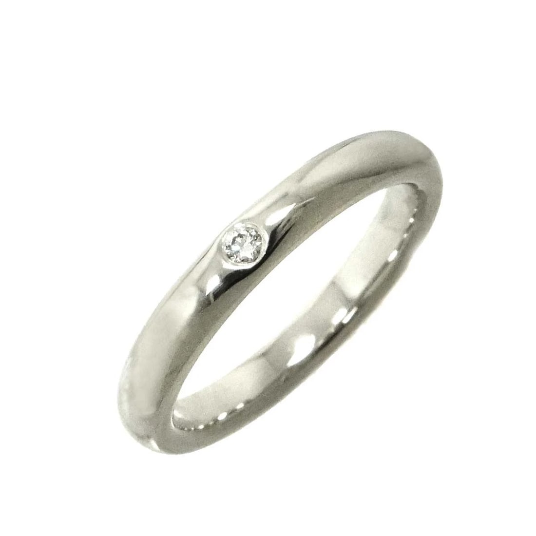 TIFFANY CO. STACKING BAND RING DIAMOND 1P PLATINUM: TIFFANY Co. Stacking Band Ring Diamond 1P Platinum Brand: TIFFANY Co. Type: Ring Material: Pt Platinum Main Stone/Creation Natural Color: Platinum Size: 3.75-4(US) Accessories: None Access