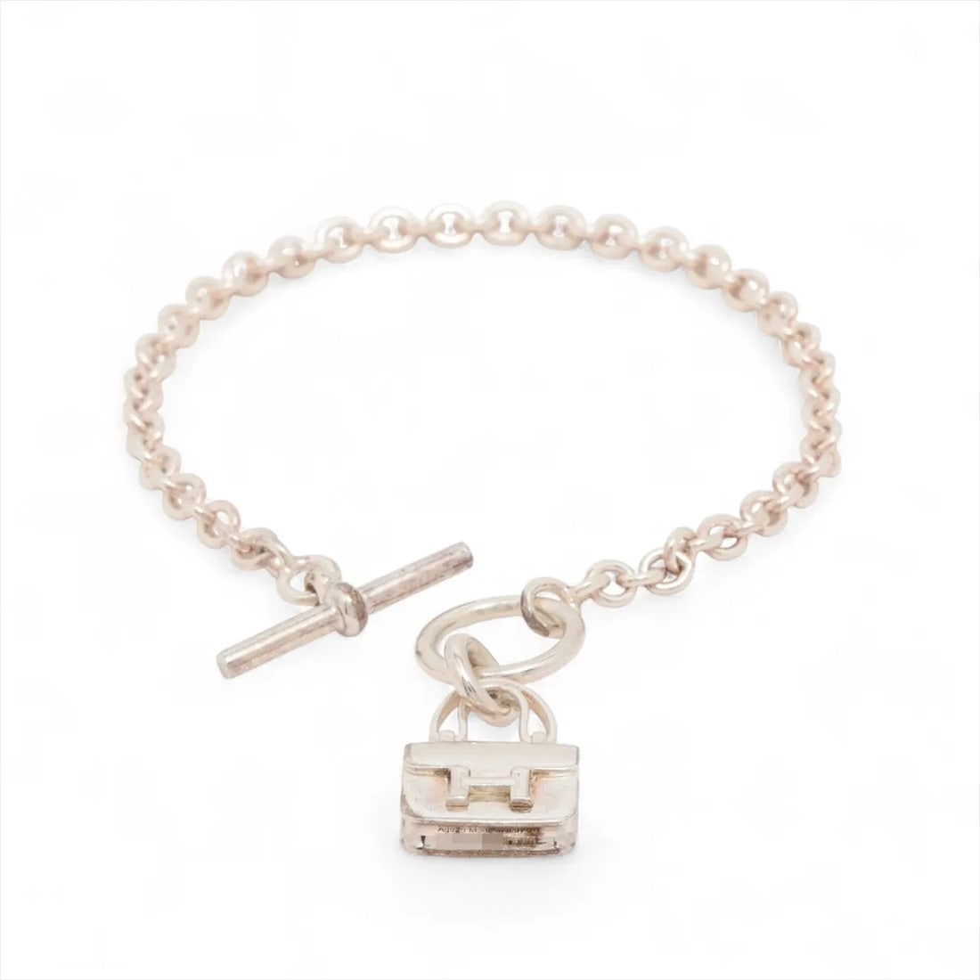 HERMÈS AMULET CONSTANCE BRACELET 925: Hermès Amulet Constance Bracelet 925 Brand: Hermès Type: Bracelet Material: 925 Silver Color: Silver Size: Bracelet length:16 Accessories: None Accessories Notice: When purchasing pre-owned