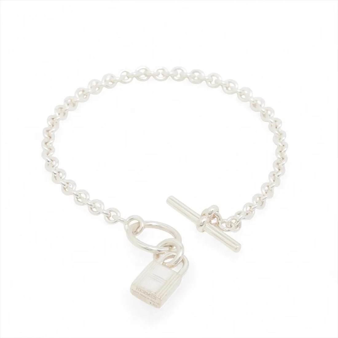 HERMÈS AMULET CADENA LOCK BRACELET 925 SILVER: Hermès Amulet Cadena lock Bracelet 925 Silver Brand: Hermès Type: Bracelet Material: 925 Silver Color: Silver Size: Bracelet length:17 Accessories: None Accessories Notice: When purchasing