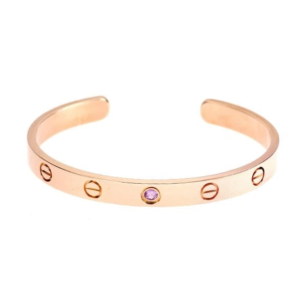 CARTIER K18PG PINK SAPPHIRE BANGLE: Cartier K18PG Pink Sapphire Bangle Brand: Cartier Type: bangles Material: Metal K18PG Main Stone/Creation sapphires Color: Gold Size: Length/Width/Diameter6.2Width/Thickness2.0 Accessories: