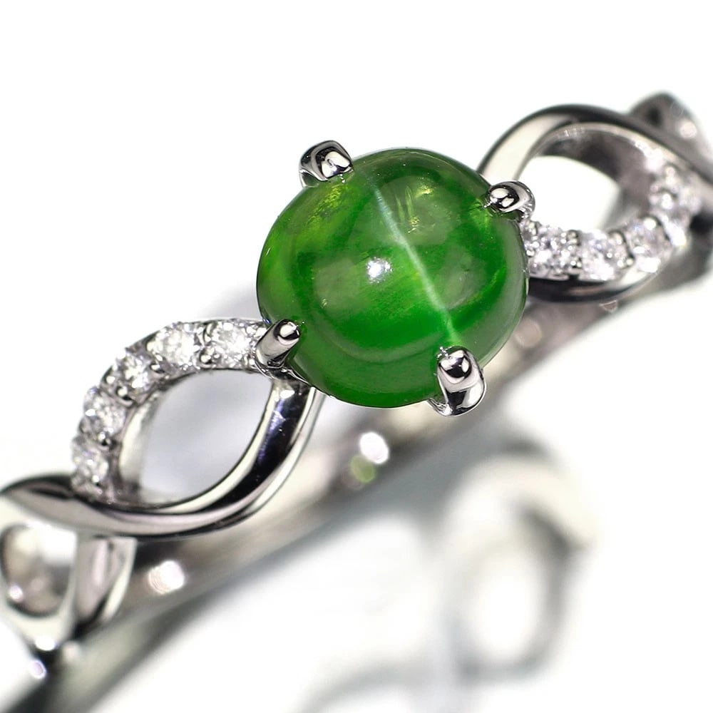 PT950 TANZANIAN KORNERUPINE CAT'S EYE DIAMOND RING: Pt950 Tanzanian Kornerupine Cat's Eye Diamond Ring Brand: None Type: ring Material: Metal Pt950 Main Stone/Creation Catseye Color: None Size: 6 US Accessories: None Accessories Notice: When