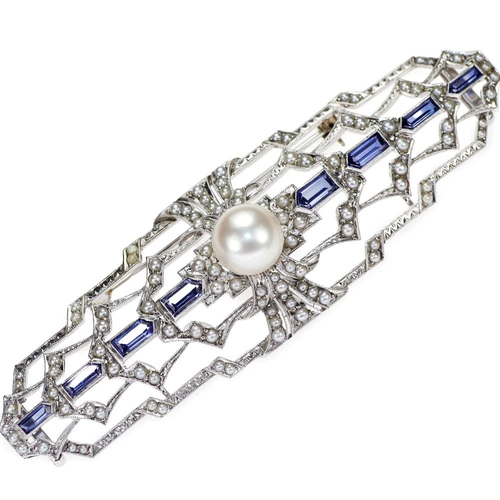MIKIMOTO K9WG AKOYA PEARL SEED PEARL SYNTHETIC SAPPHIRE BROOCH: Mikimoto K9WG Akoya Pearl Seed Pearl Synthetic Sapphire Brooch Brand: Mikimoto Type: brooch Material: Metal K9WG Main Stone/Creation pearl/pearl Color: None Size: Length/Width/Diameter21.0Width/Th