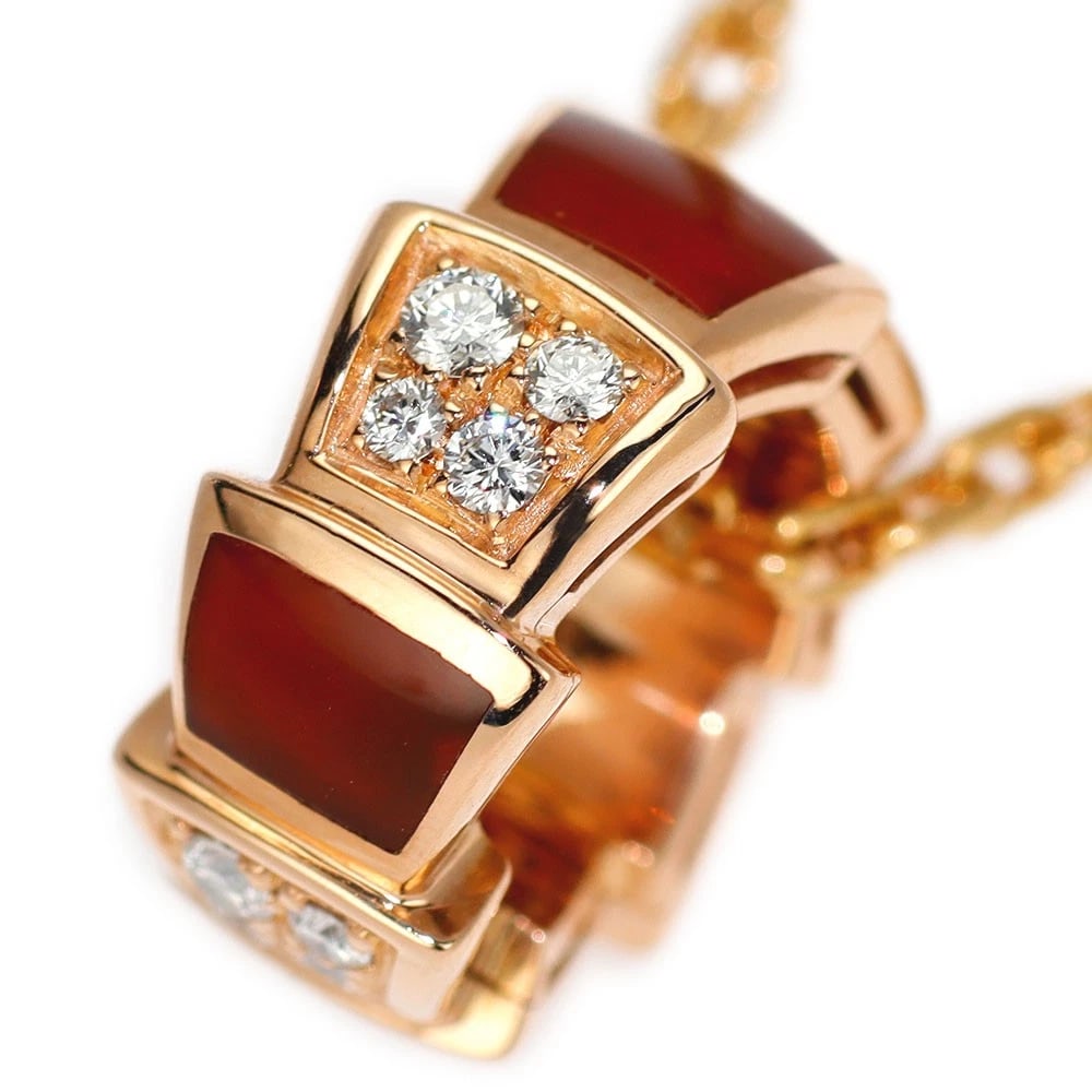 BULGARI K18PG CARNELIAN DIAMOND PENDANT NECKLACE: Bulgari K18PG Carnelian Diamond Pendant Necklace Brand: Bvlgari Type: pendant necklace Material: Metal K18PG Color: None Size: Length/Width/Diameter13.4Width/Thickness6.2 Accessories: None
