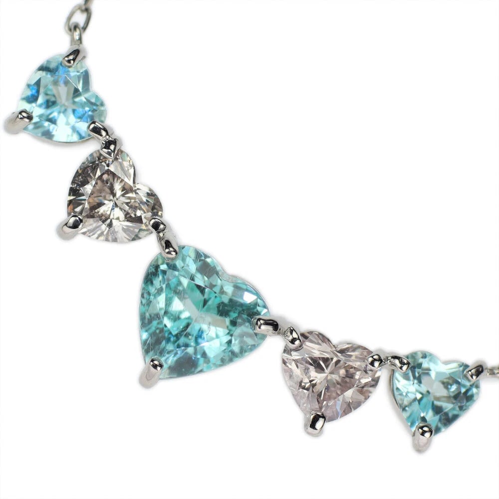 PT900/PT850 HEART SHAPE PARAIBA TOURMALINE PENDANT NECKLACE: Pt900/Pt850 Heart Shape Paraiba Tourmaline Pendant Necklace Brand: None Type: pendant necklace Material: Metal Pt850 Main Stone/Creation tourmaline Color: None Size: Necklace: Chain Length ~46