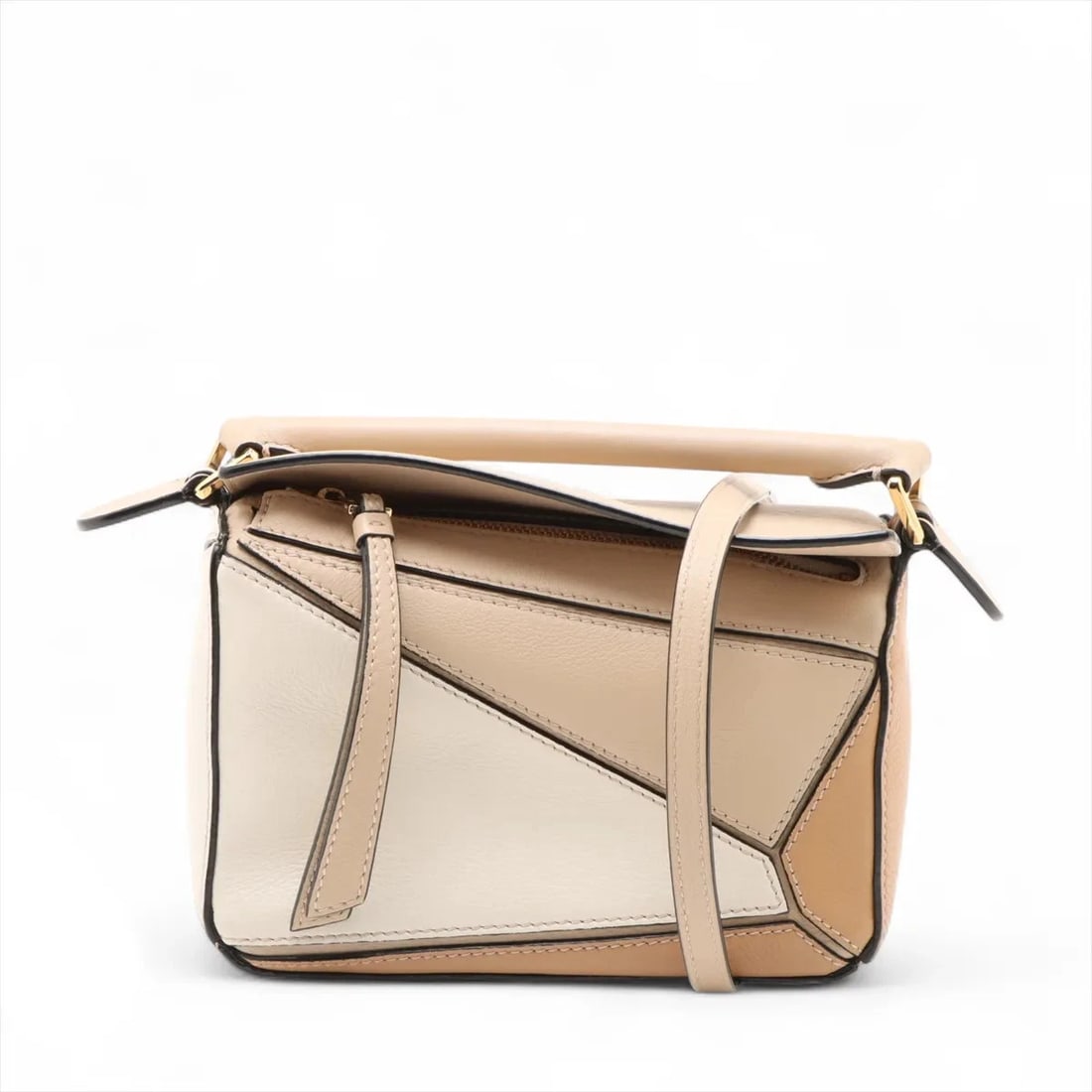 LOEWE MINI PUZZLE BAG LEATHER 2 WAY HANDBAG: Loewe Mini Puzzle Bag Leather 2 Way Handbag Brand: Loewe Type: Hand bag Material: Leather Color: Beige Size: Height:4.1inch Length:6.7inch Depth:2.8inch Handle height:1.2inch Shoulder height:21.1i
