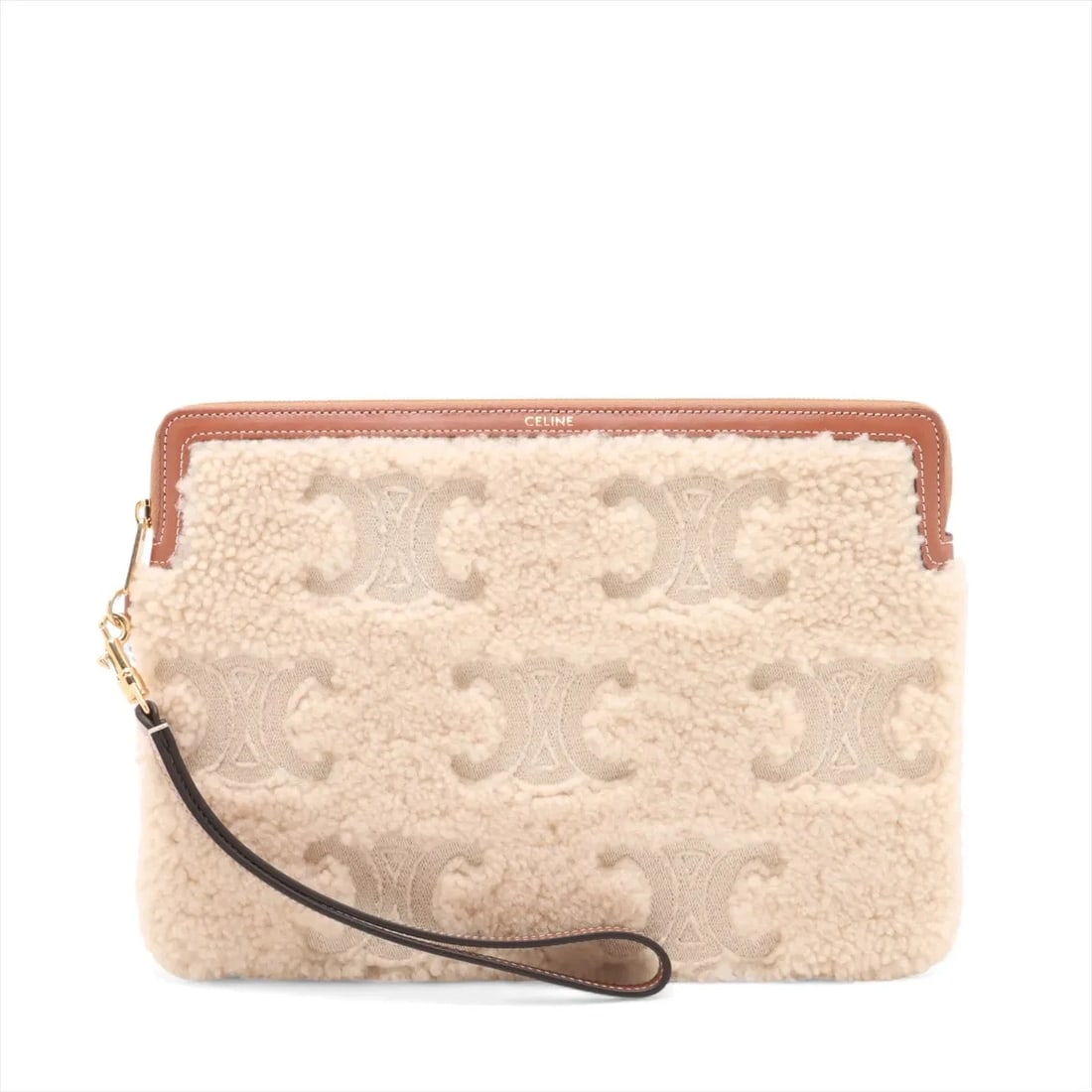 CELINE TRIOMPHE SHEARLING X LEATHER CLUTCH BAG: Celine Triomphe shearling x leather Clutch bag Brand: Celine Type: Clutch bag Material: Shearing Color: Beige Size: Height:7.1inchLength:10.2inch Accessories: None Accessories Notice: When