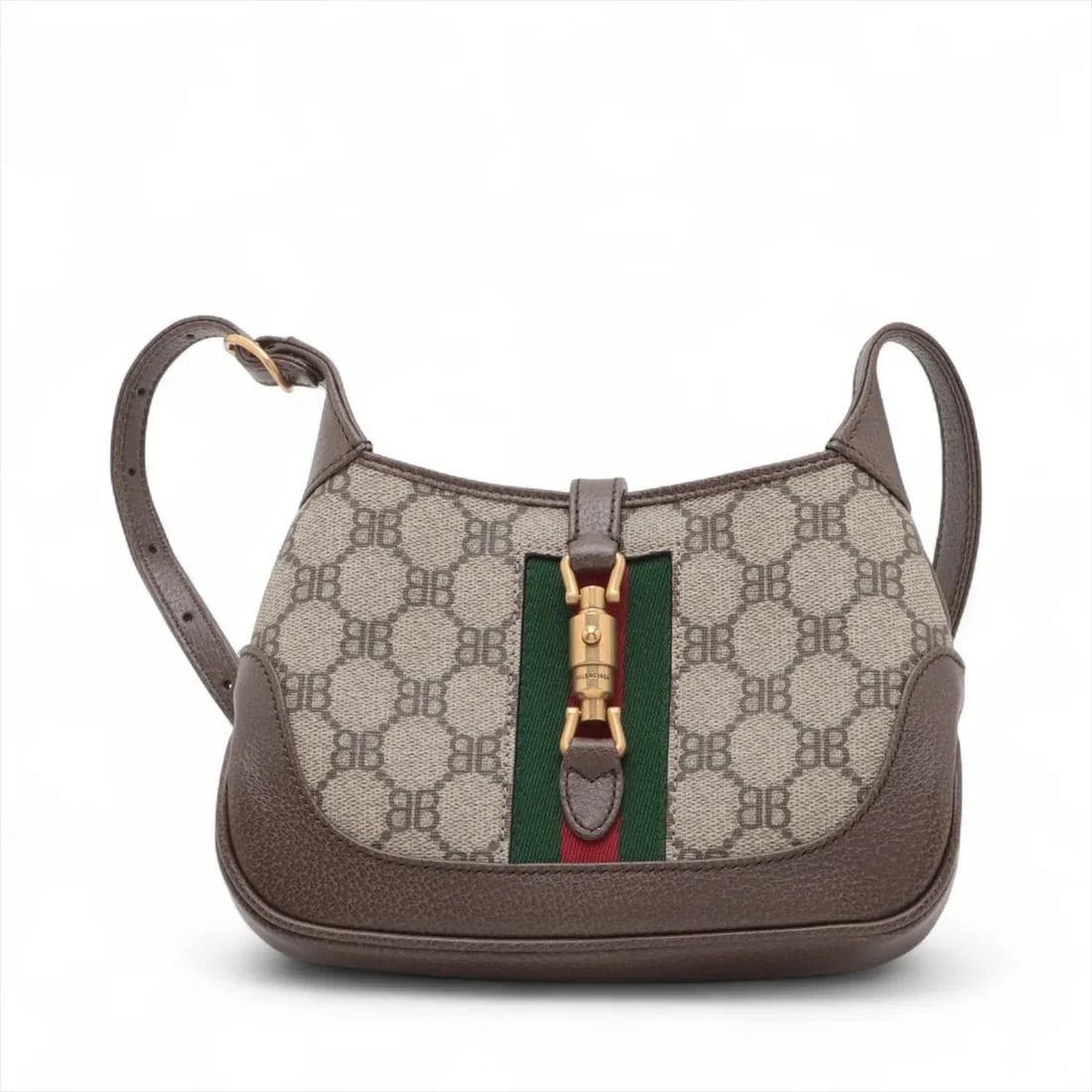 GUCCI X BALENCIAGA JACKIE PVCX LEATHER SHOULDER BAG: Gucci x Balenciaga Jackie PVCx leather Shoulder bag Brand: Gucci x Balenciaga Type: Shoulder bag Material: PVC Color: Brown Size: Height:5.3inch Length:7.5inch Depth:1.2inch Shoulder height:24.0in