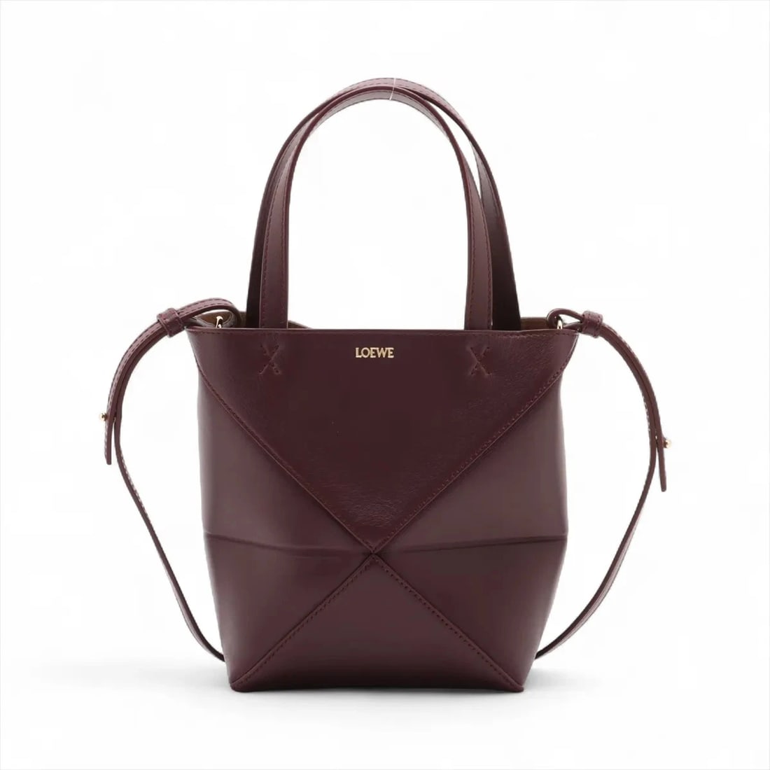LOEWE PUZZLE FOLD TOTE BAG MINI LEATHER 2 WAY HANDBAG: Loewe puzzle fold Tote Bag Mini Leather 2 Way Handbag Brand: Loewe Type: Hand bag Material: Leather Color: Bordeaux Size: Height:8.1inch Length:6.3inch Depth:3.5inch Handle height:5.7inch Shoulder