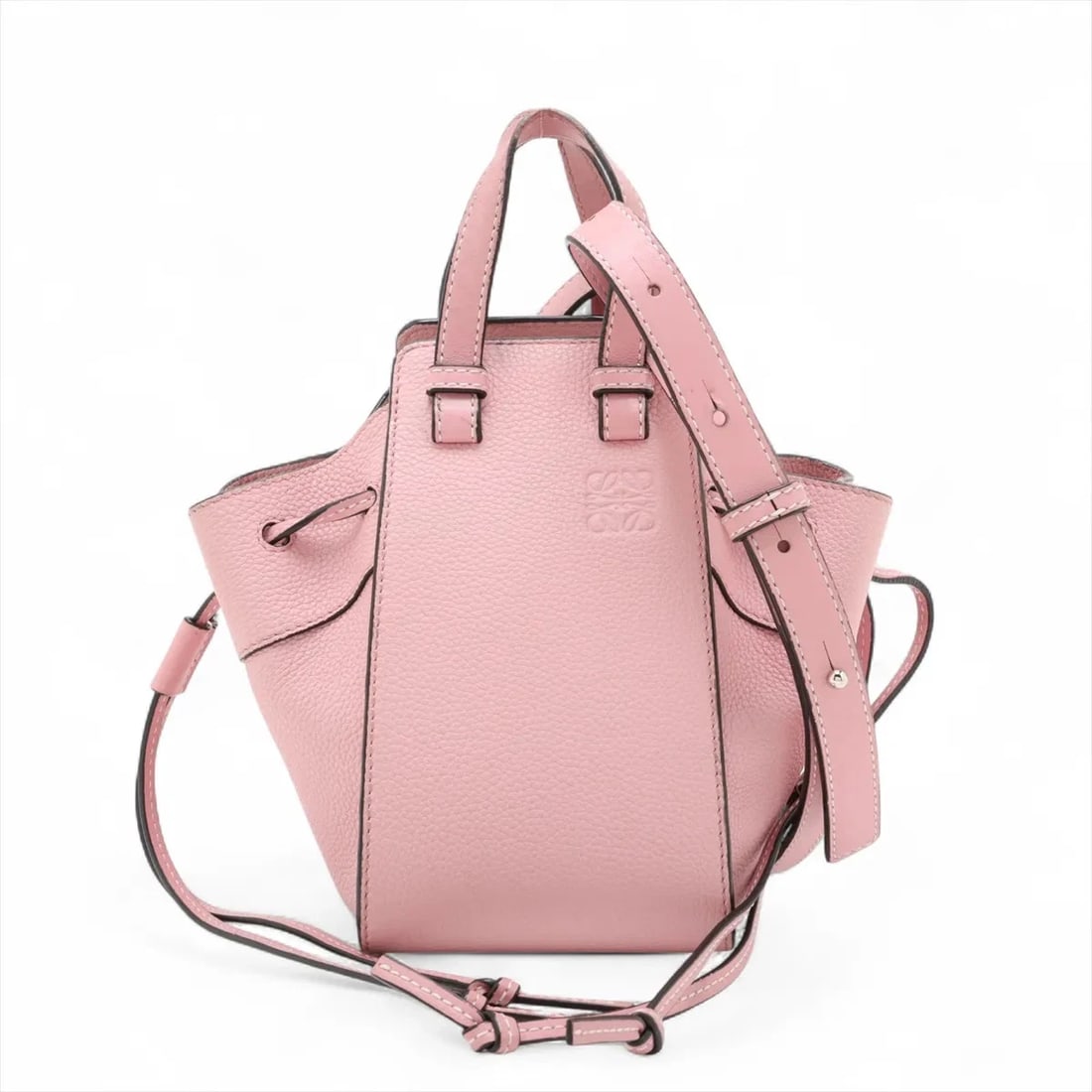 LOEWE HAMMOCK DRAWSTRING MINI LEATHER 2 WAY HANDBAG: Loewe Hammock Drawstring Mini Leather 2 Way Handbag Brand: Loewe Type: Hand bag Material: Leather Color: Pink Size: Height:7.1inch Length:4.1inch Depth:6.9inch Handle height:2.6inch Shoulder heigh