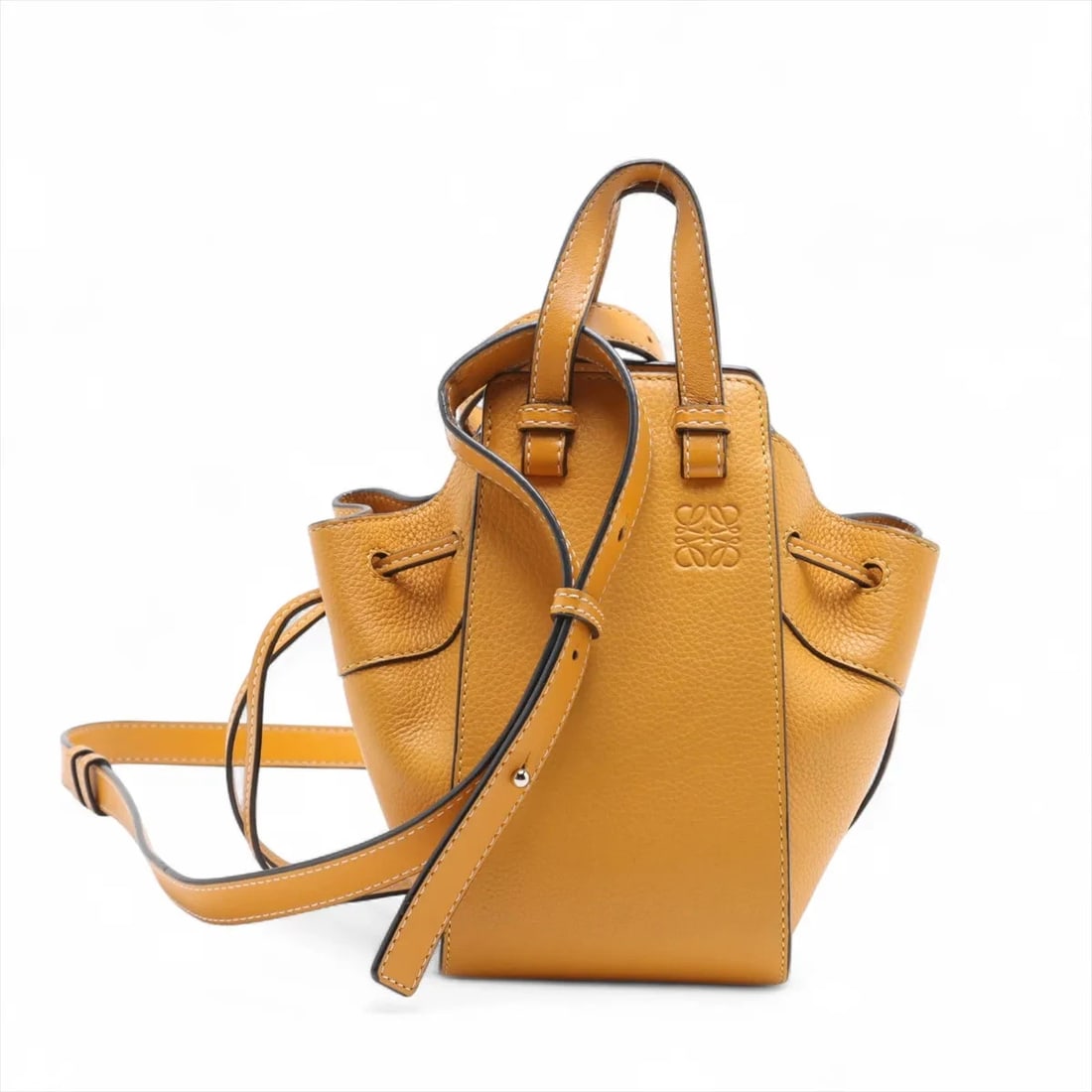 LOEWE HAMMOCK DRAWSTRING MINI LEATHER 2 WAY HANDBAG YELLOW: Loewe Hammock Drawstring mini Leather 2 Way Handbag Yellow Brand: Loewe Type: Hand bag Material: Leather Color: Yellow Size: Height:7.7inch Length:4.1inch Depth:6.5inch Handle height:2.8inch Shoul