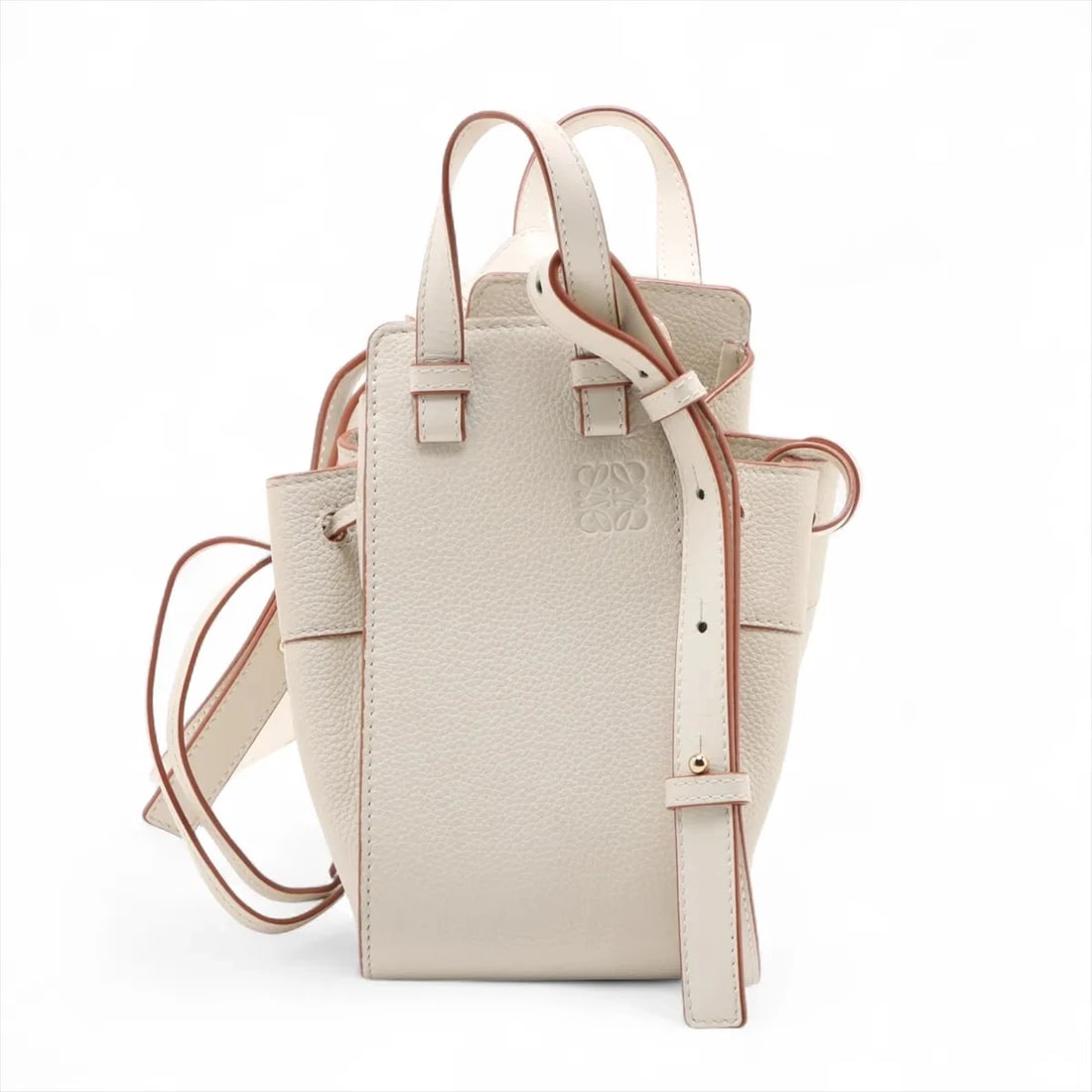 LOEWE HAMMOCK DRAWSTRING MINI LEATHER 2 WAY HANDBAG: Loewe Hammock Drawstring Mini Leather 2 Way Handbag Brand: Loewe Type: Hand bag Material: Leather Color: Beige Size: Height:7.9inch Length:4.1inch Depth:6.7inch Handle height:2.6inch Shoulder heig
