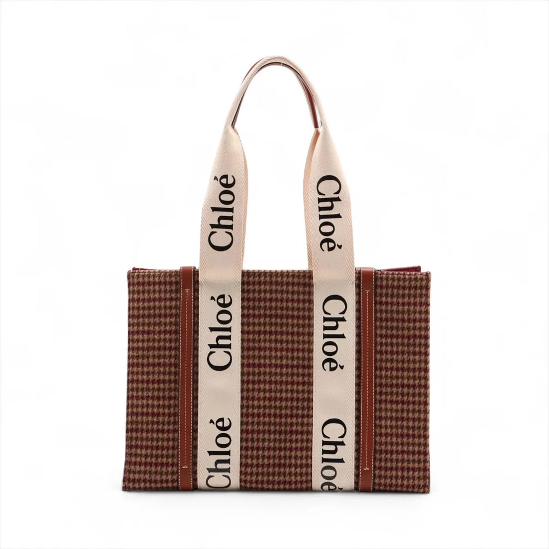 CHLOE WOODY MEDIUM FELT X LEATHER TOTE BAG BROWN: Chloe woody Medium felt x leather Tote bag Brown Brand: Chloe Type: Tote bag Material: Felt Color: Brown Size: Height:10.2inch Length:14.4inch Depth:4.5inch Handle height:10.0inch Accessories: No