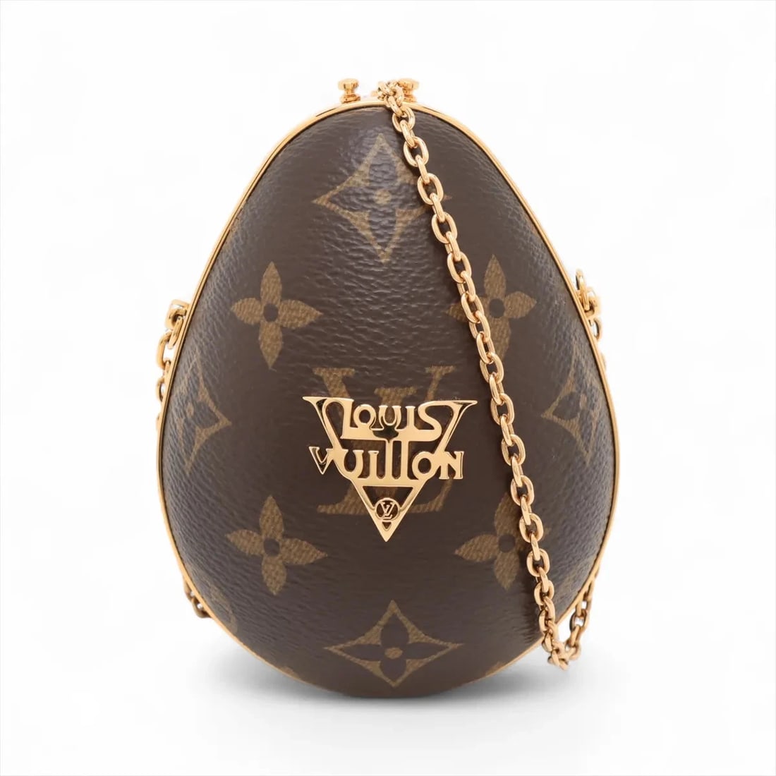 LOUIS VUITTON MONOGRAM LV EGG CASE BROWN: Louis Vuitton Monogram LV egg case Brown Brand: Louis Vuitton Type: Shoulder bag Material: Monogram Color: Brown Size: Height:4.5inch Length:3.5inch Depth:3.1inch Shoulder height:18.9inch Accesso