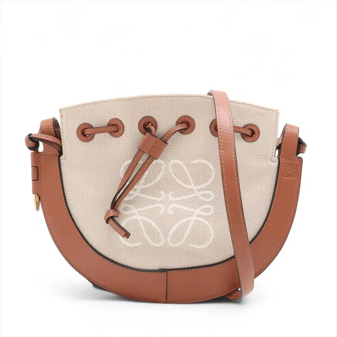 LOEWE HORSE SHOE CANVAS X LEATHER SHOULDER BAG: Loewe Horse Shoe canvas x leather Shoulder bag Brand: Loewe Type: Shoulder bag Material: canvas Color: Beige Size: Height:9.1inch Length:11.2inch Depth:0.4inch Shoulder height:21.7inch Accessorie