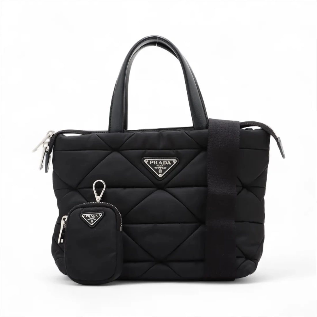 PRADA TESSUTO QUILTING NYLON X LEATHER 2 WAY HANDBAG: Prada Tessuto quilting nylon x leather 2 Way Handbag Brand: Prada Type: Hand bag Material: Nylon Color: Black Size: Height:7.5inch Length:9.1inch Depth:5.1inch Handle height:4.7inch Shoulder heigh