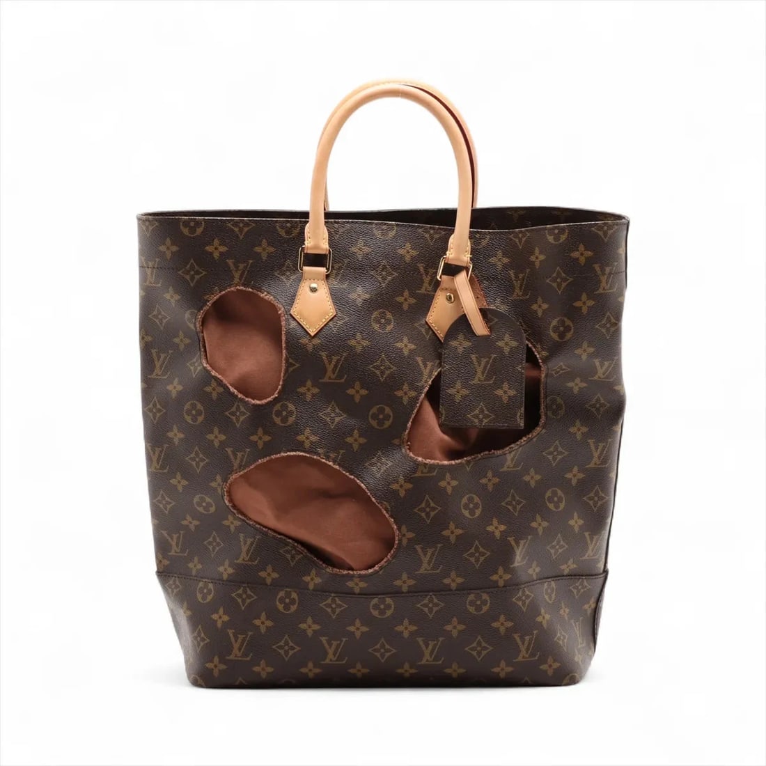 LOUIS VUITTON × COMME DES MONOGRAM (1 of 8)