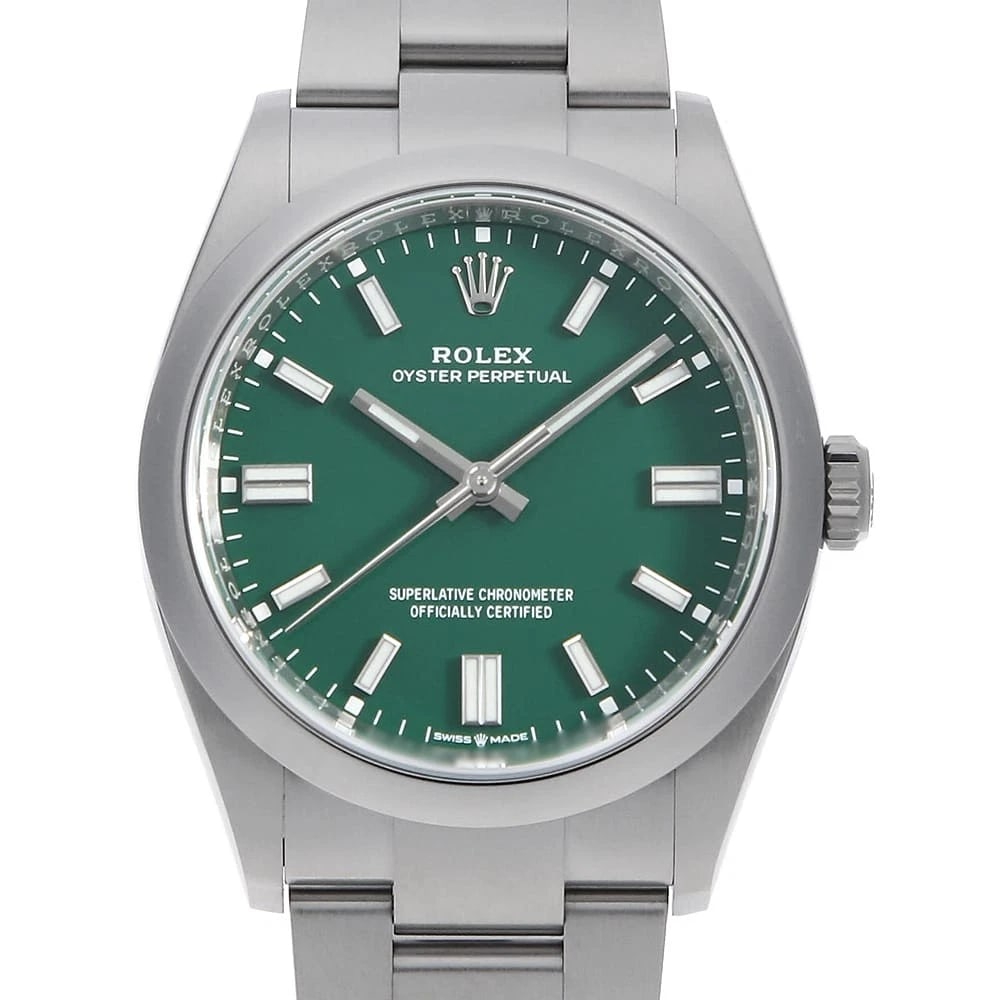 ROLEX OYSTER PERPETUAL GREEN WATCH: ROLEX Oyster Perpetual green Watch Brand: ROLEX Type: Wrist watch Material: Band Material Stainless Steel, Case Material Stainless Steel Color: Dial Color Green Size: Band Size 18.5cm