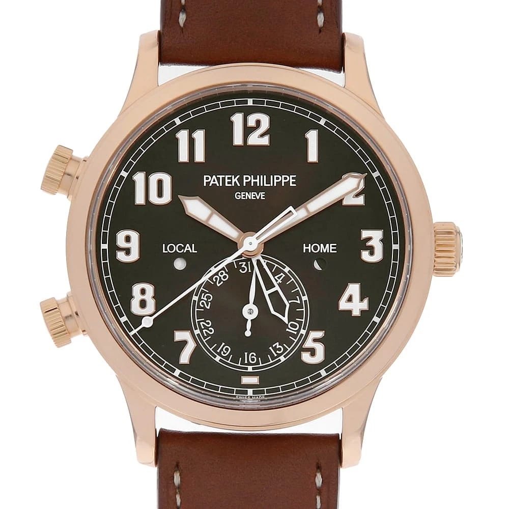 PATEK PHILIPPE CALATRAVA PILOT TRAVEL WATCH: PATEK PHILIPPE Calatrava Pilot Travel Watch Brand: PATEK PHILIPPE Type: Wrist watch Material: Band Material Calfskin, Case Material Rose Gold Color: Dial Color Brown Size: Band Size NONE, Case Siz