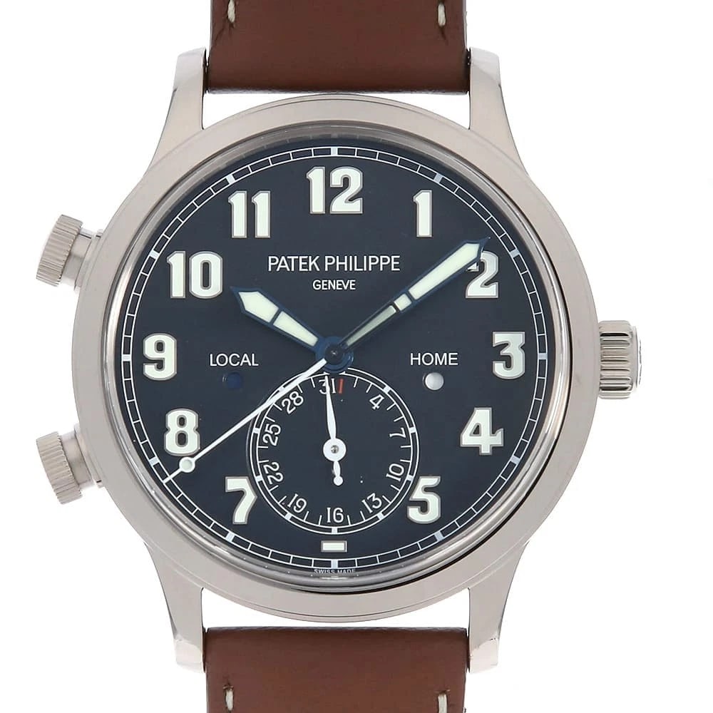 PATEK PHILIPPE CALATRAVA PILOT TRAVEL WATCH: PATEK PHILIPPE Calatrava Pilot Travel Watch Brand: PATEK PHILIPPE Type: Wrist watch Material: Band Material Calfskin, Case Material White Gold Color: Dial Color Blue Size: Band Size NONE, Case Siz