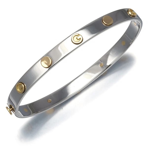 GUCCI BRACELET LOGO BANGLE 18K 750 YELLOW GOLD/STAINLESS STEEL: GUCCI Bracelet Logo Bangle 18K 750 Yellow Gold/Stainless Steel Brand: GUCCI Type: Bracelet Material: 18K / 750 / Yellow Gold Stainless There is no gold stamp of the metal purity on the item but the