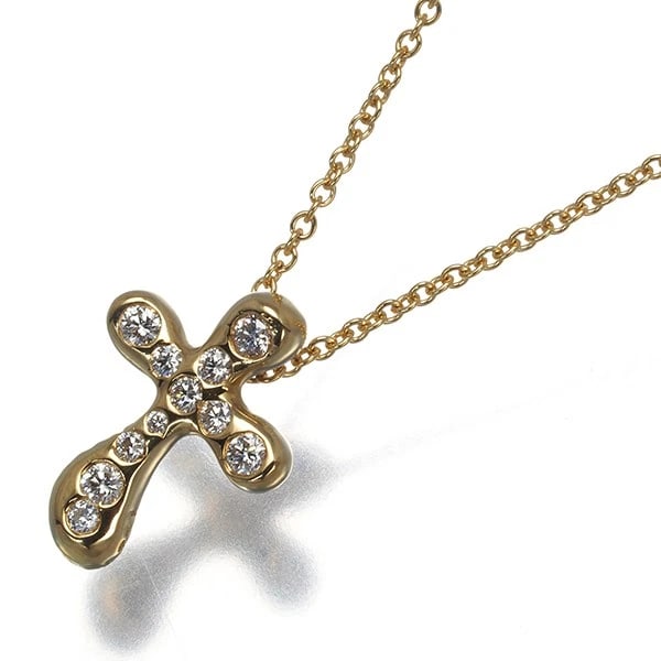 TIFFANY&CO. NECKLACE DIAMOND SMALL CROSS: Tiffany&Co. Necklace Diamond Small Cross Brand: Tiffany & Co. Type: Necklace Material: 18K / 750 / Yellow Gold Main Stone/Creation Natural Color: None Size: Necklace length: 40cm Pendant size: