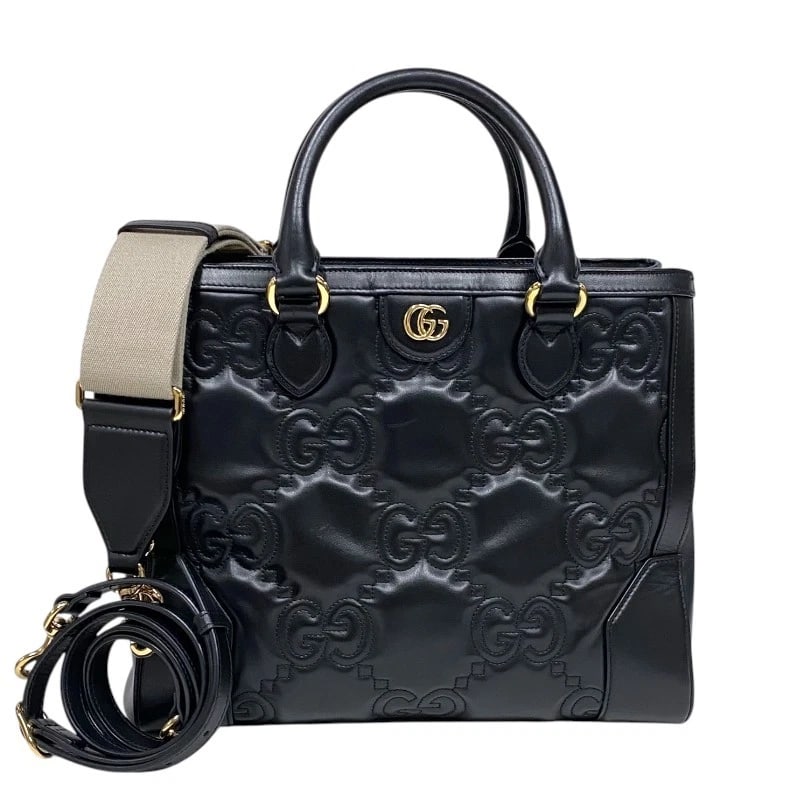 GUCCI GG MATELASSE 2-WAY TOTE BAG: GUCCI GG Matelasse 2-Way Tote Bag Brand: GUCCI Type: Tote Bag Material: GG Matelasse Leather Color: Black Gold Hardware Size: W12.2 x H10.4x D3.9inch Shoulder:44.5inch Accessories: None