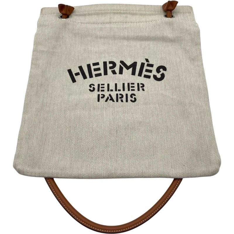 HERMES ARENA MM SHOULDER BAG: HERMES Arena MM Shoulder Bag Brand: HERMES Type: Shoulder Bag Material: canvas Color: Natural Beige Size: W11.0 x H13.0x D0.2inch Shoulder:33.9inch Accessories: None Accessories Notice: When