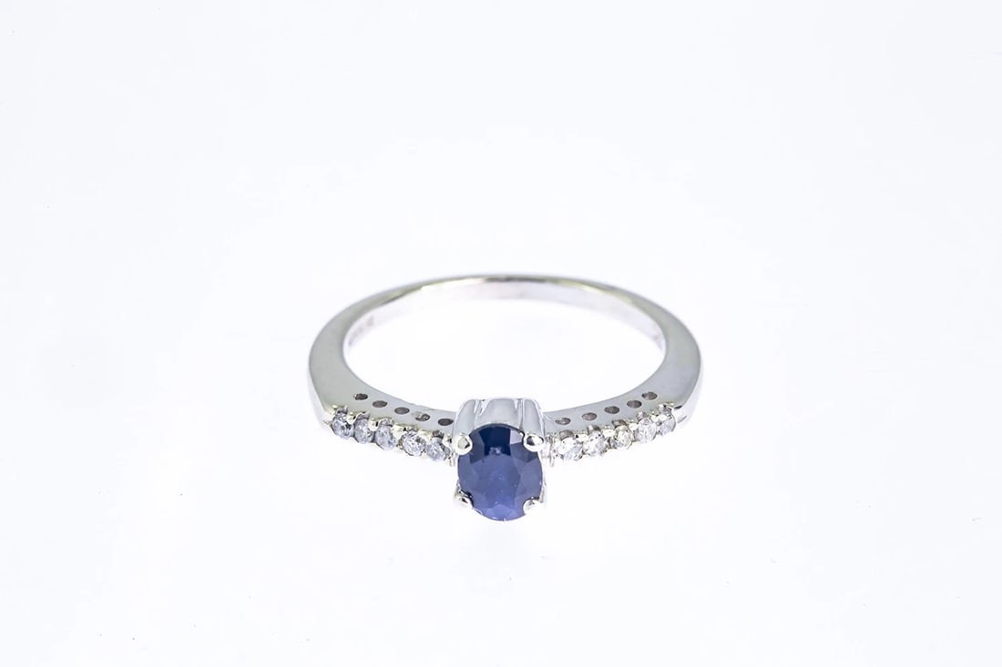 NISSKO 14KT WHITE GOLD OVAL SAPPHIRE RING: Nissko 14kt White Gold Oval Sapphire Ring Brand: Nissko Type: Ring Material: White Gold 14k Main Stone/Creation Natural Color: White Size: 5.5 US Accessories: None Accessories Notice: When