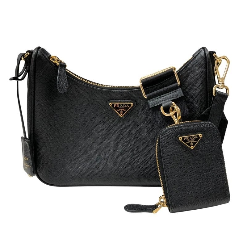 PRADA RE-EDITION SHOULDER BAG: PRADA Re-Edition Shoulder Bag Brand: PRADA Type: Shoulder Bag Material: Safiano leather Color: Black Gold Hardware Size: W8.9 x H6.3x D2.4inch Shoulder:30.7inch Accessories: None Accessori