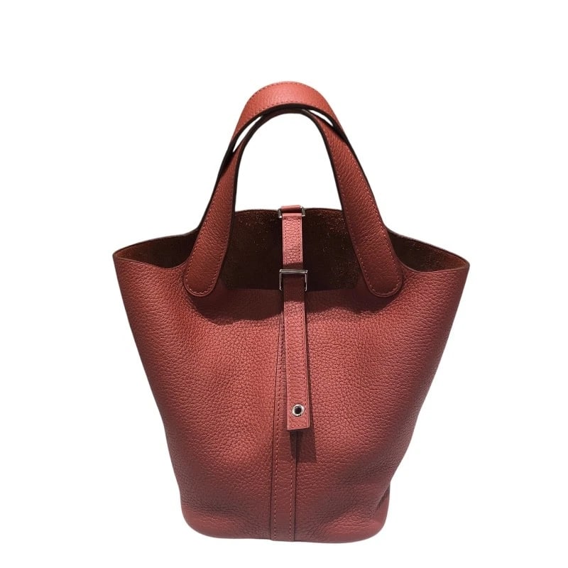 HERMES PICOTAN LOCK PM HANDBAG: HERMES Picotan Lock PM Handbag Brand: HERMES Type: Handbag Material: Taurillon Clemence Color: Brick Silver Hardware Size: W7.5 x H7.5x D5.1inch Accessories: None Accessories Notice: When