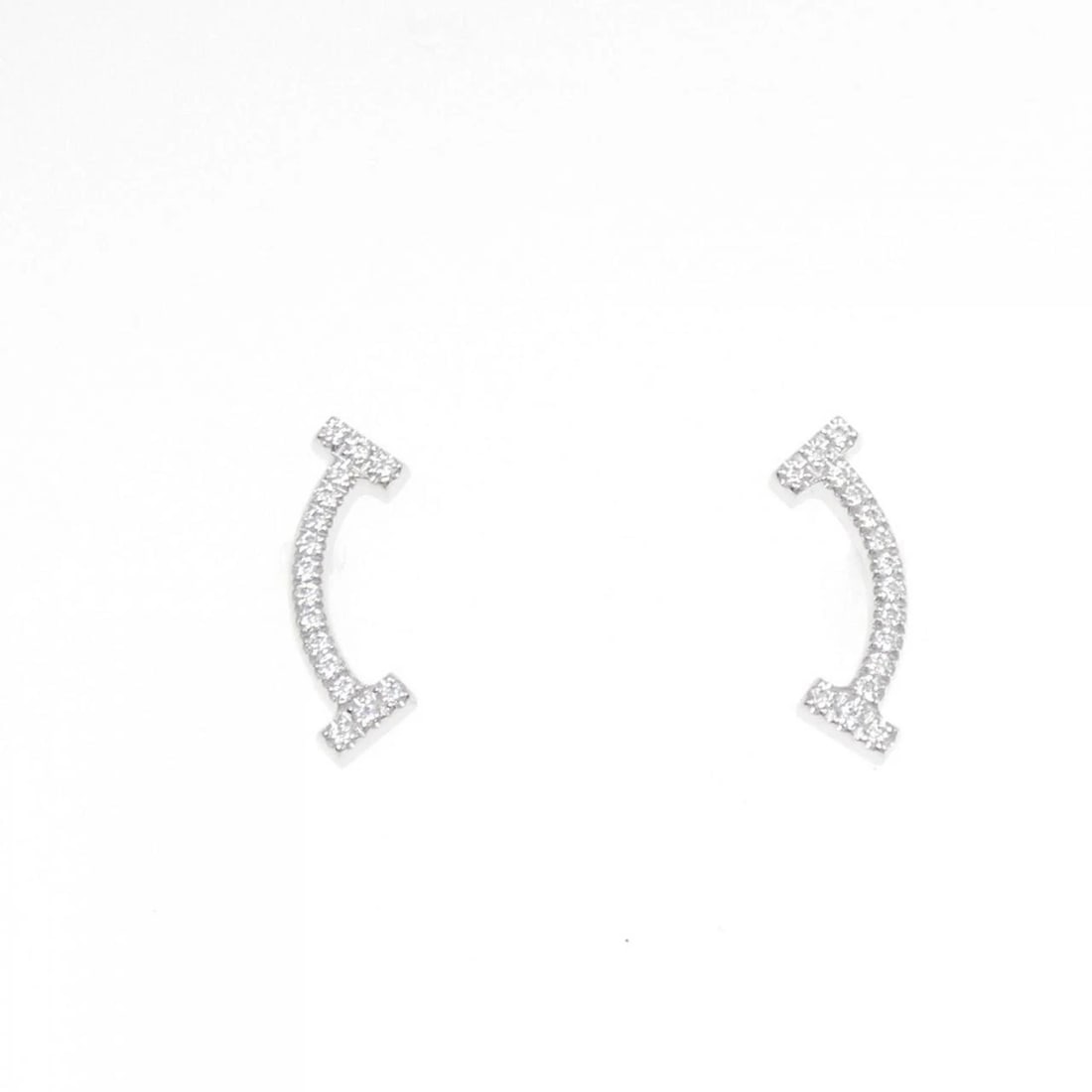 TIFFANY T SMILE EARRINGS: Tiffany T Smile Earrings Brand: Tiffany Type: Earrings Material: 750 White Gold Main Stone/Creation Natural Color: White Gold Size: ActualSize HxW: 13.1mmx4.4mm Accessories: None Accessories