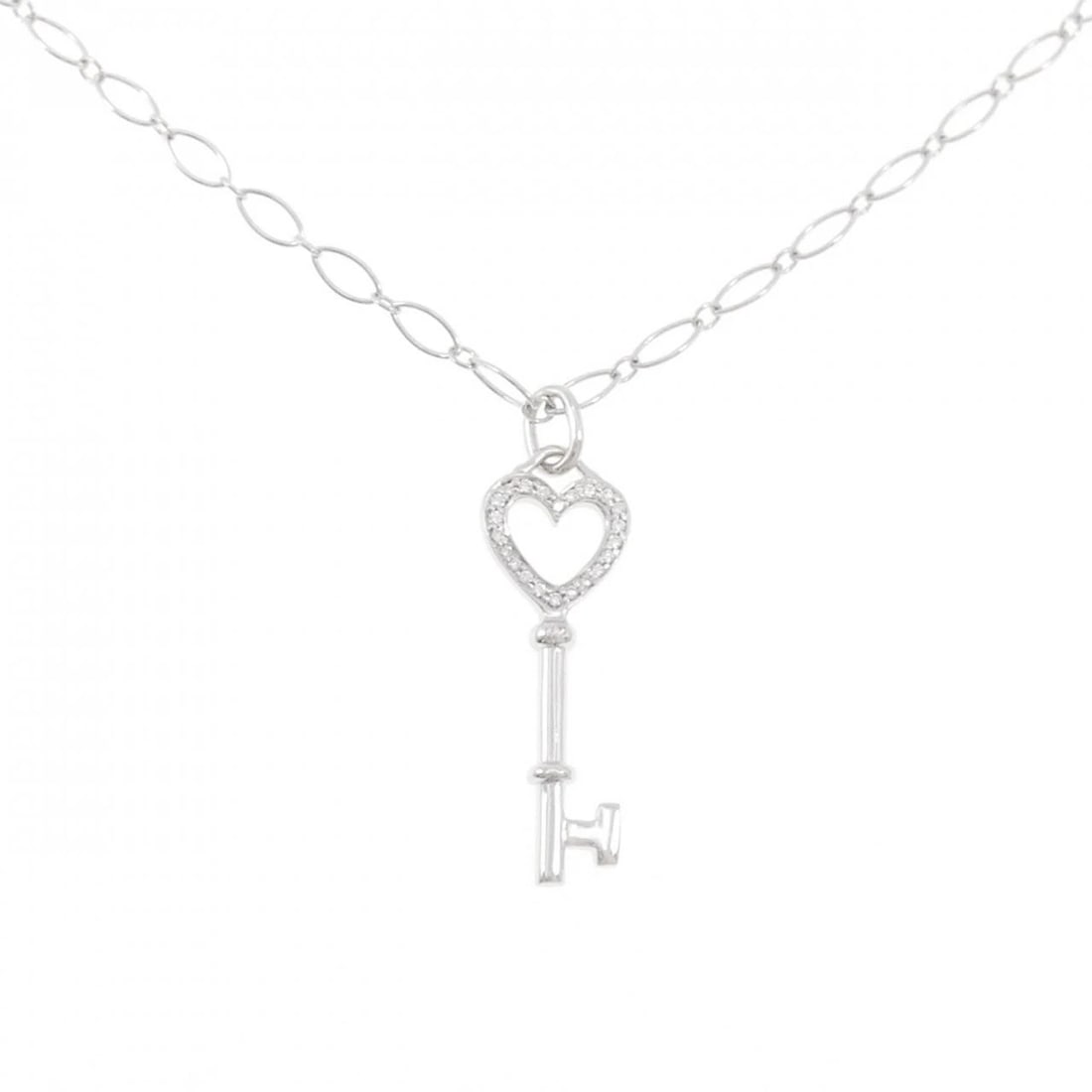 TIFFANY HEART KEY MINI NECKLACE: Tiffany Heart Key mini Necklace Brand: Tiffany Type: Necklace Material: 750 White Gold Main Stone/Creation Natural Color: White Gold Size: 46cm Accessories: None Accessories Notice: When