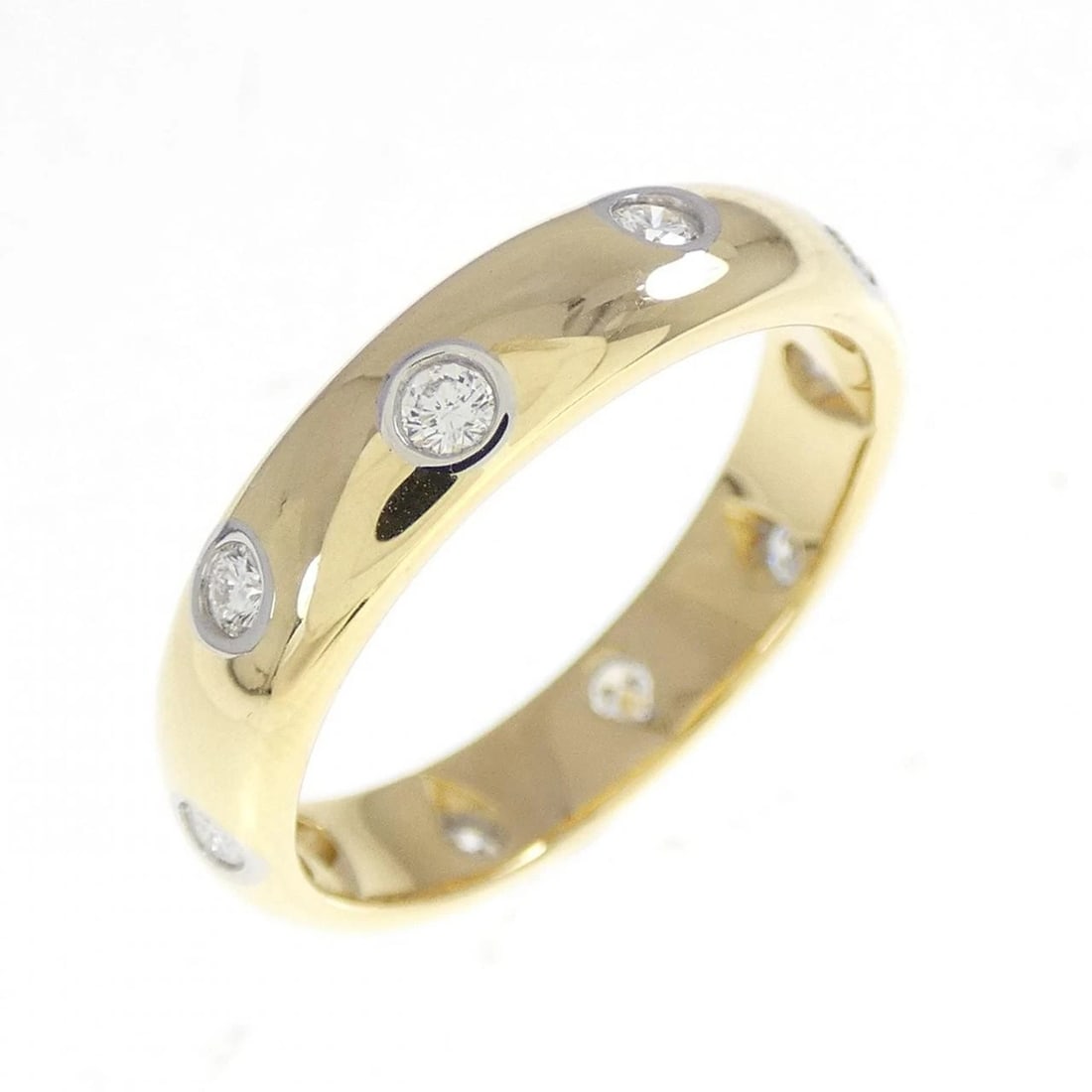 TIFFANY & CO. DOTS RING: Tiffany & Co. Dots Ring Brand: Tiffany Type: Ring Material: 750 Yellow Gold Platinum 950 Main Stone/Creation Natural Color: Yellow Gold Size: 5.5 (US size) Accessories: None Accessories