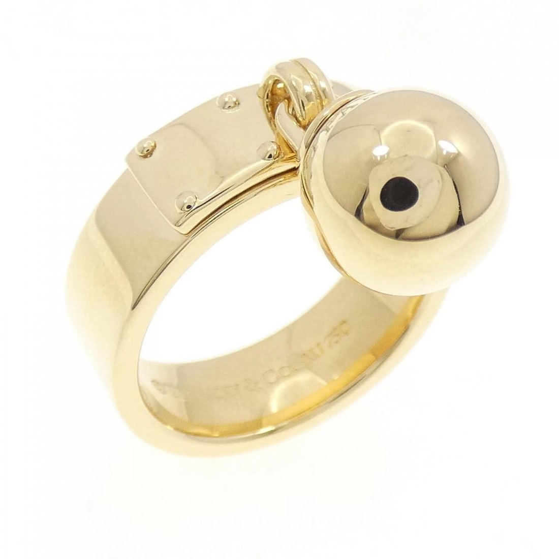 TIFFANY BALL DANGLE RING: Tiffany Ball Dangle Ring Brand: Tiffany Type: Ring Material: 750 Yellow Gold Color: Yellow Gold Size: 7 (US size) Accessories: None Accessories Notice: When purchasing pre-owned goods, please