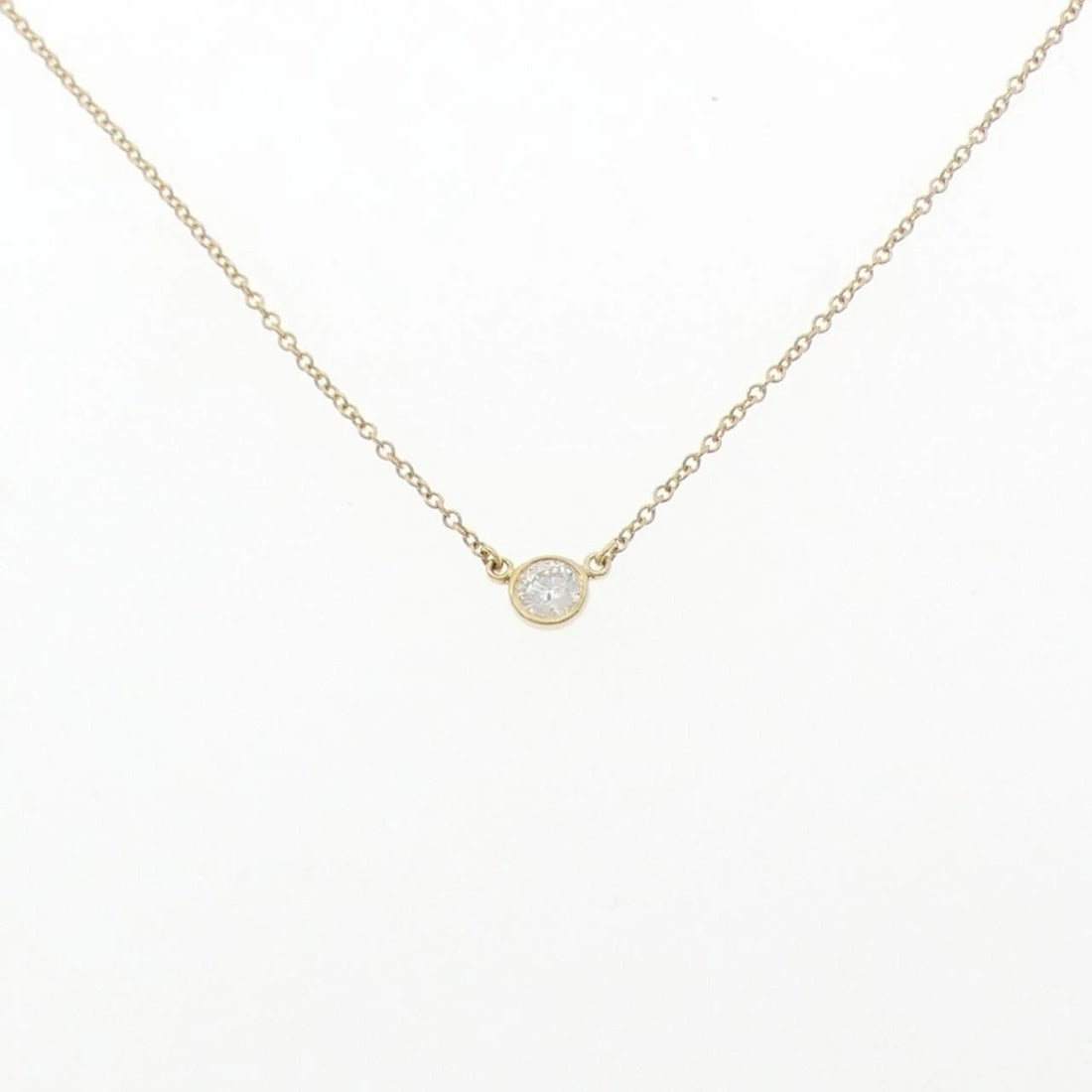 TIFFANY & CO. BY THE YARD NECKLACE: Tiffany & Co. By the Yard Necklace Brand: Tiffany Type: Necklace Material: 750 Yellow Gold Main Stone/Creation Natural Color: Yellow Gold Size: 41cm Accessories: None Accessories Notice: When