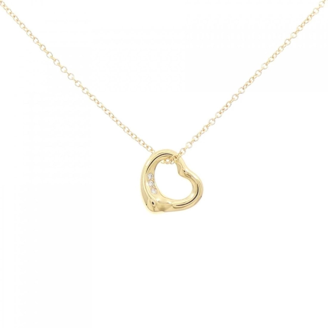 TIFFANY & CO. OPEN HEART NECKLACE: Tiffany & Co. Open Heart Necklace Brand: Tiffany Type: Necklace Material: 750 Yellow Gold Main Stone/Creation Natural Color: Yellow Gold Size: 41cm Accessories: None Accessories Notice: When